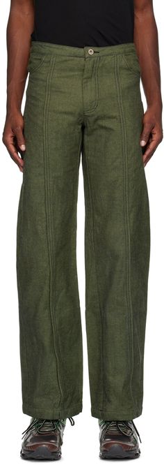 Organic cotton twill trousers. · Paneled construction · Four-pocket styling · Zip-fly · Central piping at legs · Offset piping at back legs · Contrast stitching in black Supplier color: Green Olive Trousers With Side Pockets, Utility Trousers With Contrast Stitching, Green Parachute Trousers With Side Pockets, Green Relaxed Fit Trousers, Military Style Trousers With Patch Pockets, Casual Pants Style, Twill Trousers, Pants Style, Contrast Stitch