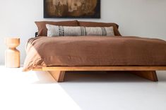 This piece ships free in the continental United States!Price includes FREE white glove shipping. *There may be an additional charge on pieces shipped to the West Coast* Contact us for designer/trade pricing. This Sabi Modern Platform Bed is made in the heart of Ohio with locally sourced wood. Each is hand-made from solid white maple (or the wood of your choice) and finished with a beautiful commercial grade matte finish. The simple lines and shape of this bed work well with all aesthetics. It of King Bed Wood, Platform Bed With Nightstands, Wabi Sabi Bed, Platform Bed Modern, Japanese Platform Bed, New Mid Century Modern, Low Platform Bed, Low Profile Platform Bed, Wood Counter Stools