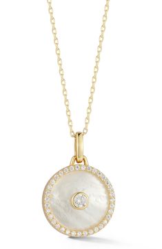 Elevate your wardrobe in a statement-making pendant necklace that's ideal as a standalone piece or as a layered look. 18" length; 5/8" diameter pendant Sterling silver/rhodium plate or 14k-gold plate/mother-of-pearl/cubic zirconia Made in Turkey Mother Of Pearl Necklace With Round Pearl Pendant, Round Pearl Pendant Necklace, Mother Of Pearl Round Pendant Necklace With Pearl, Mother Of Pearl Round Pearl Pendant Necklace, Elegant Medallion Necklace In Mother Of Pearl, Elegant Mother Of Pearl Medallion Necklace, Mother Of Pearl Pendant Necklace With Pearl Pendant, Mother Of Pearl Pendant Necklace With Pearl Detail, Elegant Medallion Pearl Necklace With Pendant