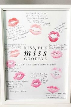 a white frame with pink lipstick on it and the words kiss the miss goodbye written in cursive writing