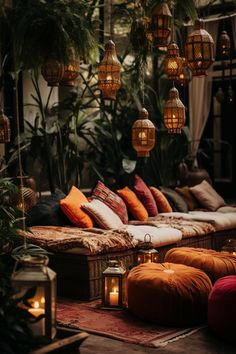 a living room filled with lots of pillows and lights