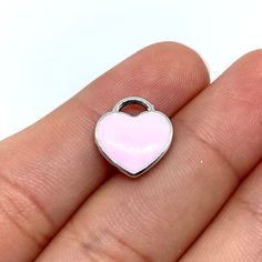 Zinc alloy pink heart charm. Cute Pink Nickel-free Jewelry, Cute Pink Double Heart Jewelry, Cute Heart-shaped Metal Jewelry, Metal Heart Charm For Valentine's Day, Pink Open Heart Jewelry For Valentine's Day, Valentine's Day Metal Heart Charm, Pink Heart Pendant Metal Jewelry, Pink Heart Pendant Jewelry, Cute Pink Heart Beads Necklace