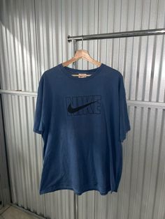 Vintage 90s Nike tee -Size: XL -Condition: 9/10 near perfect  No major flaws 90s Oversized Logo Print T-shirt, Oversized 90s T-shirt With Logo Print, Blue Oversized 90s Style Top, 90s Oversized Blue Top, 90s Style Oversized Blue Top, Oversized 90s Blue Top, 90s Blue Oversized Top, Oversized 90s T-shirt With Crew Neck, Oversized 90s Crew Neck T-shirt