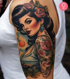 a woman with tattoos on her arm and shoulder