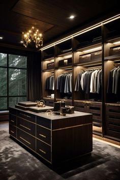 a large walk in closet with lots of clothes