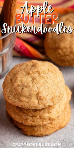 two cookies stacked on top of each other with cinnamon sticks in the background and text overlay that reads apple butter snickkendoodleles