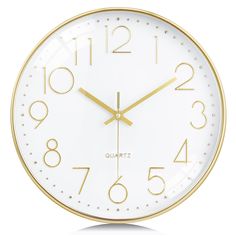 a white and gold clock with numbers on the face is shown against a white background