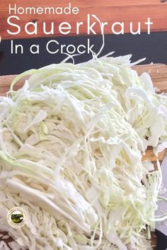 shredded cabbage sitting on top of a cutting board