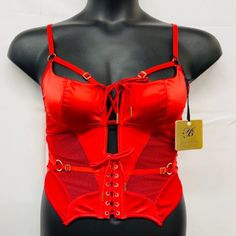 -Wire-Free Corset Top -Hot Red Satin With Stretch Mesh Panels -Square Neckline With Adjustable Caging -Spiral Boning Down The Front -Elastic Strapping At The Waist -Eyelet Details & Lace-Up Rouleau -Back Hook & Eye Fastenings -Comes With Honey Birdette Hanger Red Corset With Built-in Bra For Night Out, Red Underwire Party Corset, Red Underwire Corset For Party, Party Corset With Built-in Bra In Red, Honey Birdette, Red Corset, Thigh High Stockings, Red Satin, Square Necklines