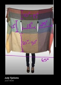 a woman is holding up a blanket with the measurements for her pants and shoes on it