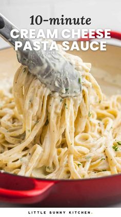 a spoon full of creamy pasta being held up with the words 10 - minute cream cheese pasta