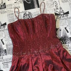 This Corset Prom Dress From Sean Collection Is Super Cute! It’s Brand New With Tags. It’s Red And Has Sequins Embroidered All Over The Bodice And Some Of The Skirt. The Bodice Doesn’t Have Any Boning. The Straps Aren’t Adjustable. The Dress Is Midi Length And Has 3 Layers. It Zips Up On The Back. It’s Missing A Few Sequins, But It’s Nothing Major Or Too Noticable And Overall It’s In Great Condition. Tagged As A Large Measurements Bust (Underarm To Underarm): ~18 Inches Laying Flat/36 Inches Wais Maroon Dress Short, Red Beaded Dress, Corset Prom Dress, Red Halter Dress, Thrift Inspo, Prom Inspo, Prom Midi Dress, Banquet Dresses, Corset Dress Prom