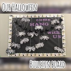 the bulletin board is decorated with halloween decorations