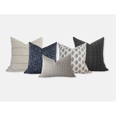 six pillows in different colors and patterns