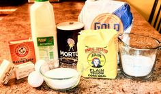 ingredients to make an egg muffin sitting on a counter