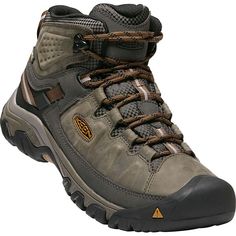 The Men's KEEN Targhee III Mid Waterproof Hiking Boots are perfect for all-terrain adventures. The KEEN Targhee III is chosen by hikers all over the world for its rugged durability. These men's hiking boots feature speed hooks for easy lace adjustment and Cleansport NXT™ for natural odor control. Plus, an ESS shank provides lightweight support and a leather mud shield and KEEN.DRY technology keep dirt and water out. Hit the trail for years to come in the Men's KEEN Targhee III Mid Waterproo Fuzzy Heels, Shop Boots Online, Womens Casual Boots, Mens Boots Casual, Pacific Crest Trail, Waterproof Winter Boots