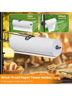 the wind - proof paper towel holder is attached to a pole