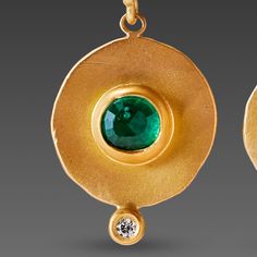 These striking 22k yellow gold disk earrings have a sparkling center rose cut emerald, accented by tiny sparkling white diamonds set below. Disks measure approximately 1/2 inch in diameter. 18k earwires. Earrings hang approximately 1 inch from top of earwire. Matte finish. These earrings will be made to order, and will ship within 10-14 business days. If you need them sooner, use the Notes section on the order form to request a rush. Disk Earrings, Multicolor Jewelry, Gold Disc, Disc Earrings, Hammered Gold, Order Form, Jewelry Inspo, Elegant Earrings