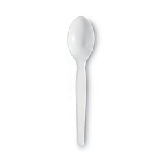 a white spoon sitting on top of a table