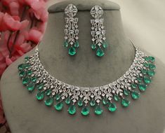 Sea Green Shining CZ Diamonds Necklace Earrings Set/ Silver Bridal Jewelry Set/ Indian Pakistani Party Wear Statement Necklace Earrings Set Metal        = Silver Plated Occasion  = Wedding ,Party Wear, Bridal Color        =  Sea Green + Clear CZ Stones Necklace Size =  8 Inches Earrings Length = 2.5 Inches 100% Satisfaction Guarantee: 1 Year Warranty, Long Lasting Plating, High-Quality Stones Occasion: Perfect choice for any Indian occasion.  Care: It is advisable that you keep products away fro Cz Stone Necklace, Silver Bridal Jewellery, Diamond Pendant Jewelry, Bridal Diamond Necklace, Pakistani Party Wear, Diamond Necklace Designs, Diamonds Necklace, Bridal Jewelry Set, Bridal Diamond Jewellery