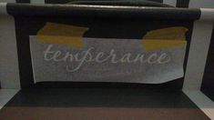 there is a sign on the back of a bus seat that says, tentervane