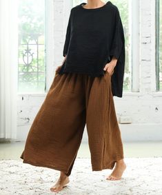 / Product Description and Story / Experience ultimate comfort with these double gauze flowing wide-leg culottes. Made from lightweight, breathable fabric, these pants feature a relaxed fit and a soft, airy texture perfect for casual outings, beach days, or lounging at home. With their versatile style, these culottes are a must-have for warm-weather wardrobes. ⟢ Crafted from breathable double gauze cotton, ensuring all-day comfort in hot weather. ⟢ The wide-leg design creates a flattering silhoue Palazzo Pants Summer, Pants For Women Casual, Casual Boho Style, Double Gaze, Womens Trousers, Womens Pants, Double Gauze, Pantalon Large, Reduce Wrinkles