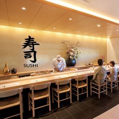 the restaurant is clean and ready for customers to enjoy their meal on the long table