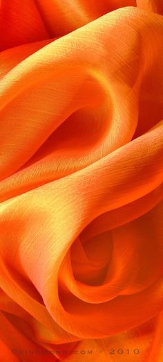 an orange fabric is shown in close up