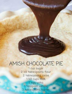 chocolate is being poured into a pie crust with the words amish chocolate pie on it