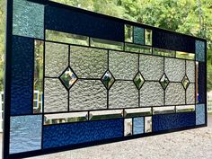 This beautiful stained glass window is made with 21 bevels. Clear granite glass is used in the center. Navy Blue English Muffle glass and light blue Vecchio glass are featured in the outer border. Five beveled squares are placed in the center and are designed to catch and reflect the light creating a wonderful visual effect. The bevels throughout the panel act as prisms that refract the light splitting into the colors of the rainbow.  This window is hand made in Ohio by Honey Dew Glass. Each pie Glass Etching Diy, Etching Diy, Car Wax, Stained Glass Projects, Leaded Glass, Panel Art, Glass Etching