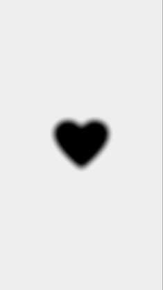 the shadow of a heart on a white background is shown in black and grey tones