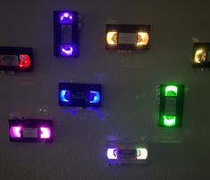 there are many different colored lights on the wall