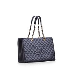 The craftsmanship and glamour of the Grand Shopping Tote by Chanel comes in this extra large size for the woman on the go who needs that extra bit of room. Chanel shopping totes are part of the classic collection thanks to their timelessly chic design. Featuring the classic CC stitched logo, paired with the signature quilting, this is truly an investment piece that will become your new favourite accessory. In black caviar leather, it will last a lifetime and it finished perfectly with gold tone hardware. SPL Exterior Black caviar leather Gold tone hardware CC stitched logo Chanel quilting Chain and leather interwoven strap Back slip pocket Excellent condition with no wear to leather or edges Interior Large zip compartment Two open compartments Two slip pockets Chanel leather logo Zip side Chanel Shopping Tote, Chanel Grand Shopping Tote, Chanel Shopping, Chanel Box, Shopping Totes, Black Caviar, Timeless Handbag, Leather Logo, Luxe Fashion