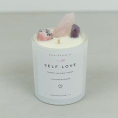 a candle that has some rocks in it