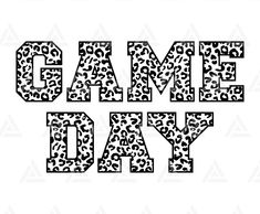 the word game day is made up of black and white leopard print, with triangles around it