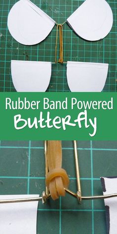 a pair of scissors is being used to cut out paper butterfly shapes on a cutting board