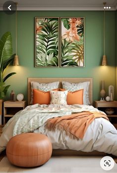 a bedroom with two paintings above the bed and an ottoman on the floor next to it