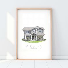 a drawing of a house on the wall in front of a white floor with a wooden frame