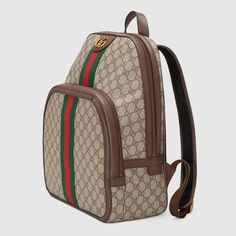 Description The backpack continues to be an important silhouette in the world of Gucci, offered in a variety of sizes and interpretations. Part of the ever-expanding world of Ophidia, it’s crafted in GG Supreme canvas with textured leather trim. The inlaid green and red Web detail and Double G hardware are steeped in the House’s rich history, referencing symbols incorporated in Gucci collections since the ’50s. Size: 12.5 x 16 x 5.5 inches / 32 x 40.5 x 14.5 cm 100% genuine materials, matching the quality of the Gucci product; Beige/ebony GG Supreme canvas, a material with low environmental impact, with brown leather trim Green and red Web Antique gold-toned hardware Double G Black mesh back Front zipper pocket Interior zipper and smartphone pockets Adjustable shoulder straps Zipper closur Mens Designer Backpacks, Clear Backpacks, Backpack Collection, Web Detail, Red Web, Mini Backpacks, Gucci Ophidia, Guccio Gucci, Small Messenger Bag