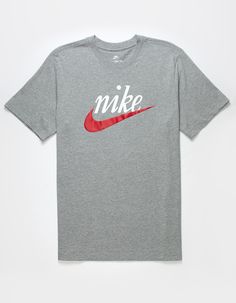 Nike Sportswear Futura Ii Tee. This Classic Cotton Tee With Our Heritage Nike Script Logo Gives You Soft Comfort For Casual, Everyday Wear. A Slight Puff To The Swoosh Print Adds A Dose Of Texture And Nostalgia. Lightweight Cotton Fabric Feels Soft And Comfortable For Casual, Everyday Wear. Relaxed Through The Shoulders, Chest And Body For An Athletic Fit You Can Layer. Ribbed Collar. 100% Cotton. Machine Wash. Imported. Sporty Logo T-shirt For Sports, Sporty Athletic Heather T-shirt For Sports, Casual Athletic Heather T-shirt For Sports, Gray Sportswear Tops For Spring, Gray Spring Sportswear Tops, Nike Cotton Activewear With Logo Print, Nike Athletic Heather Moisture-wicking Tops, Nike Moisture-wicking Athletic Heather Tops, Nike Athletic Heather Tops For Sports