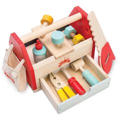 a wooden toy car with tools in it's storage compartment on a white background