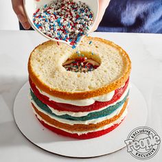 a cake with sprinkles is being served on a plate