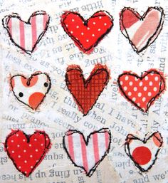 several hearts are shown on a piece of fabric