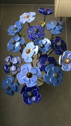 a table with blue flowers on it in a room