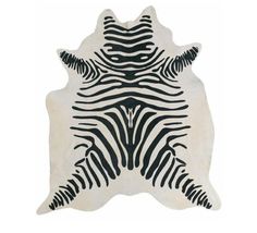 a black and white zebra skin rug on a white background