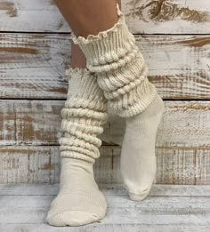 "SCRUNCHY lace ULTIMATE slouch socks - natural Slouch socks with lace top? Yes, please! Fall head over heels for our new lux cotton slouch socks! This scrumptious beige lace slouch sock is seriously soft with a natural lace trim. The absolute best way to describe this dreamy beige lace slouch sock? Super-duper-thick-cuddly-cotton-cozy-lovable-sock-itude!  Our exclusive sock, you will not find this quality sock anywhere else! 90% cotton.10% nylon fits  adult  shoe size 6-9 made in america  sock i Comfortable Fitted Cream Socks, Soft Cream Socks For Fall, Fitted Beige Socks For Spring, Cream Fitted Cozy Socks, Comfortable Cream Socks, Cozy Fitted Cream Socks, Fitted Cozy Beige Socks, Fitted Beige Cozy Socks, Cream Stretch Knee-high Socks For Spring