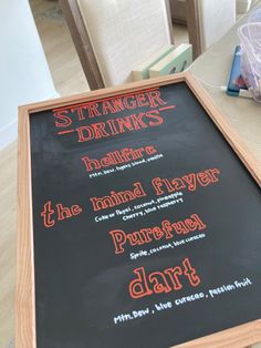 Chalkboard sign with drinks dedicated to characters and names of the the upcoming Season 4 episodes. Stranger Things Wedding Theme, Stranger Things Theme Party Food, Stranger Things Drinks, Stranger Things Menu Ideas, Stranger Things Birthday Party Ideas Food, Stranger Things Cocktails, Stranger Things Sleepover Ideas, Stranger Things Games For Party