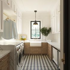 a kitchen with black and white checkered flooring next to a washer and dryer