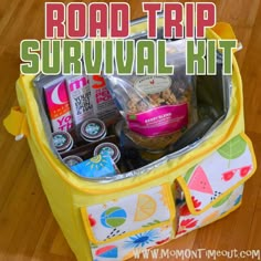 the road trip survival kit is packed in a yellow cooler with food and snacks inside