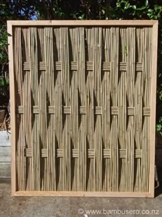 a wooden frame made out of bamboo sticks